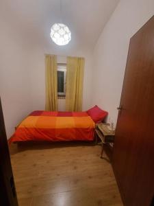 Postel nebo postele na pokoji v ubytování Casa Nicolò + 8 fotografií