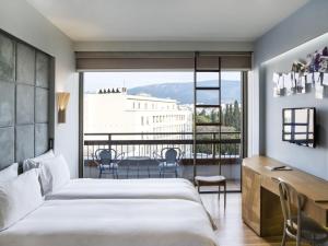 Postel nebo postele na pokoji v ubytování New Hotel + 37 fotografií