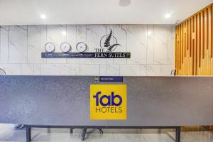 FabHotel SSR Fern Suites - 100M from GSM Mall Madeenaguda的证书、奖牌、标识或其他文件