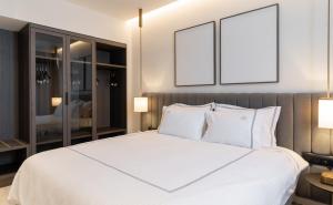 Postel nebo postele na pokoji v ubytování Nestos Hotel