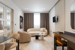 TV a/nebo společenská místnost v ubytování Nestos Hotel