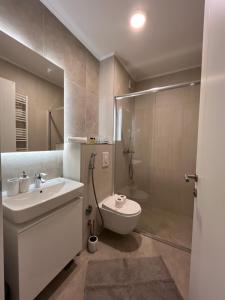 Koupelna v ubytování Sarajevo Waves Aparthotel + 37 fotografií
