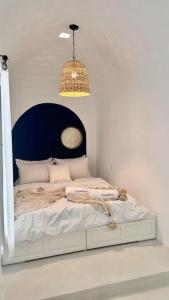 Letto o letti in una camera di Zina Apartment Sidi Bou Said