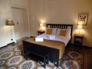 Postel nebo postele na pokoji v ubytování B&B Genova Centro