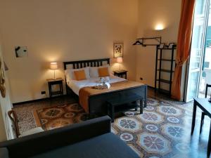 Postel nebo postele na pokoji v ubytování B&B Genova Centro