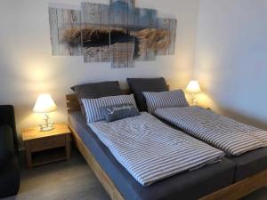 Katil atau katil-katil dalam bilik di Appartement Ankerplatz