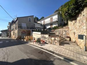 an empty street with a building on the side of the road at Casa Particolari nel Cilento in Giungano