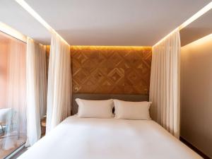 Katil atau katil-katil dalam bilik di Sofitel Marrakech Palais Impérial & Spa