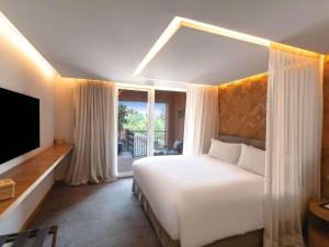 Katil atau katil-katil dalam bilik di Sofitel Marrakech Palais Impérial & Spa