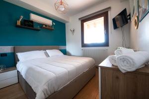 Letto o letti in una camera di La Casa di Oliviero