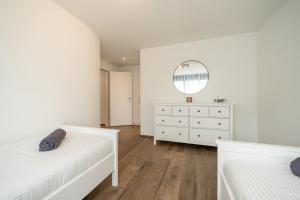 Postel nebo postele na pokoji v ubytování Swiss Suites - Menziken