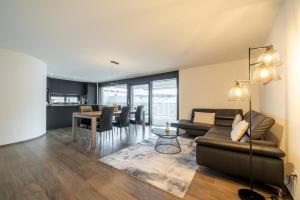 Posezení v ubytování Swiss Suites - Menziken + 15 fotografií