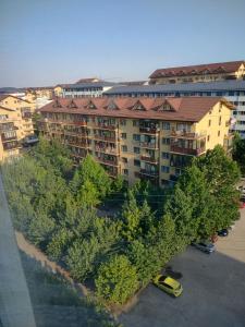 an overhead view of a large apartment building with trees at Luxury 2 Rooms Free Parking Air Conditioning Espresso Netflix Superb Modern Bright View Balcony Self Check in Militari in Bucharest