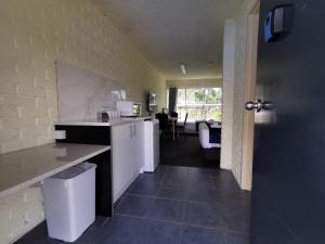 Kuchyň nebo kuchyňský kout v ubytování Aquajet Motel