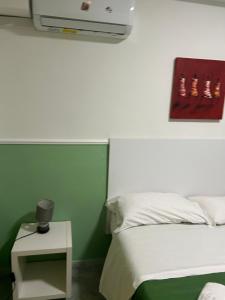 Postel nebo postele na pokoji v ubytování Hotel Alloggio Del Conte