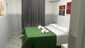 Postel nebo postele na pokoji v ubytování Hotel Alloggio Del Conte