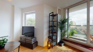 Χώρος καθιστικού στο Cozy Hackney Apartment