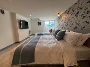 Uma cama ou camas num quarto em 墾丁卿卿文旅