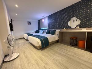Uma cama ou camas num quarto em 墾丁卿卿文旅