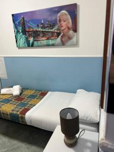 Postel nebo postele na pokoji v ubytování Hotel Alloggio Del Conte
