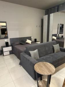 Posezení v ubytování La Bottega Suite Deluxe Monolocale