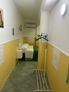Postel nebo postele na pokoji v ubytování Hotel Alloggio Del Conte