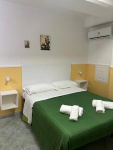 Postel nebo postele na pokoji v ubytování Hotel Alloggio Del Conte
