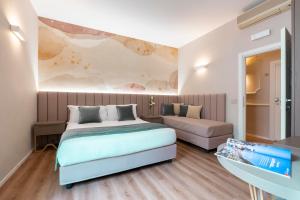 Postel nebo postele na pokoji v ubytování Hotel Magic