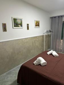 Postel nebo postele na pokoji v ubytování Hotel Alloggio Del Conte