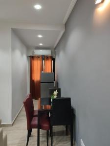 Kuchyň nebo kuchyňský kout v ubytování HOTEL APPART B4U Be For You Nos logement affichent un style résolument unique