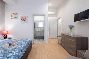 Posteľ alebo postele v izbe v ubytovaní Casa Fabio