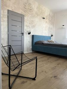 Postel nebo postele na pokoji v ubytování Family Apartments Černice