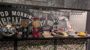 a counter with different types of food on it at HOTEL SUI AKASAKA by ABEST in Tokyo