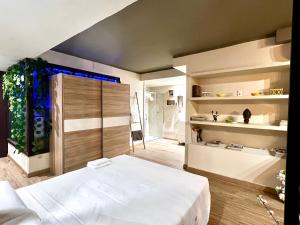 Postel nebo postele na pokoji v ubytování Tropical Loft