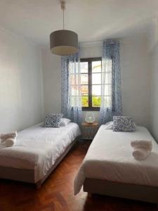 Postel nebo postele na pokoji v ubytování Casa Valhalla