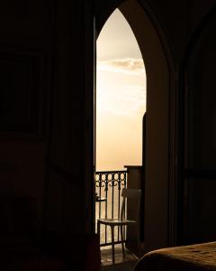 Un pat sau paturi într-o cameră la La Dolce Vita Ravello - Studio Apartment with Jacuzzi and partial Sea View