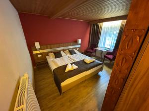 Posteľ alebo postele v izbe v ubytovaní Hotel-Landgasthof Katschtalerhof