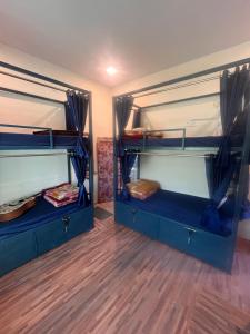 Skyard Hostel Harshil Valley客房内的一张或多张床位