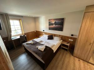 Posteľ alebo postele v izbe v ubytovaní Hotel-Landgasthof Katschtalerhof