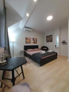 Ένα ή περισσότερα κρεβάτια σε δωμάτιο στο Cool & Cozy Center