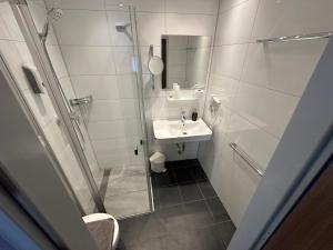 Kúpeľňa v ubytovaní Hotel-Landgasthof Katschtalerhof