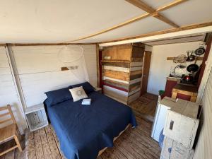 Postel nebo postele na pokoji v ubytování Solar Valizas