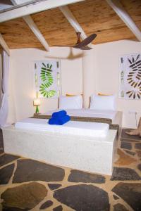 Letto o letti in una camera di Firefly Eco Retreat