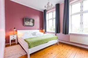 Ένα ή περισσότερα κρεβάτια σε δωμάτιο στο Alte Schule 2