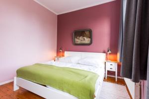 Ένα ή περισσότερα κρεβάτια σε δωμάτιο στο Alte Schule 2 +41 φωτογραφίες