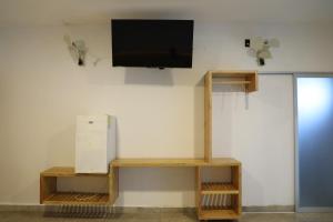 TV a/nebo společenská místnost v ubytování Hotel Playa Zipolite
