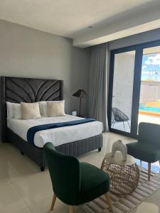 Ένα ή περισσότερα κρεβάτια σε δωμάτιο στο Bon Voyage Inn