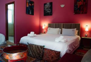En eller flere senge i et værelse på Couleurs Berbères