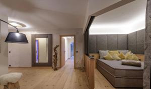 Rúm í herbergi á Hotel Alpina Wellness & Spa Resort