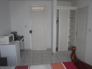 Una cocina o kitchenette en MANIKOU